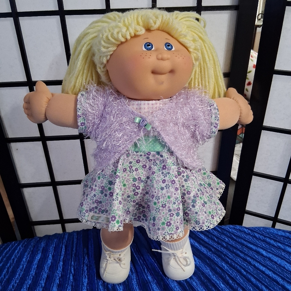 Purple and Yellow Dolls with Accessories
